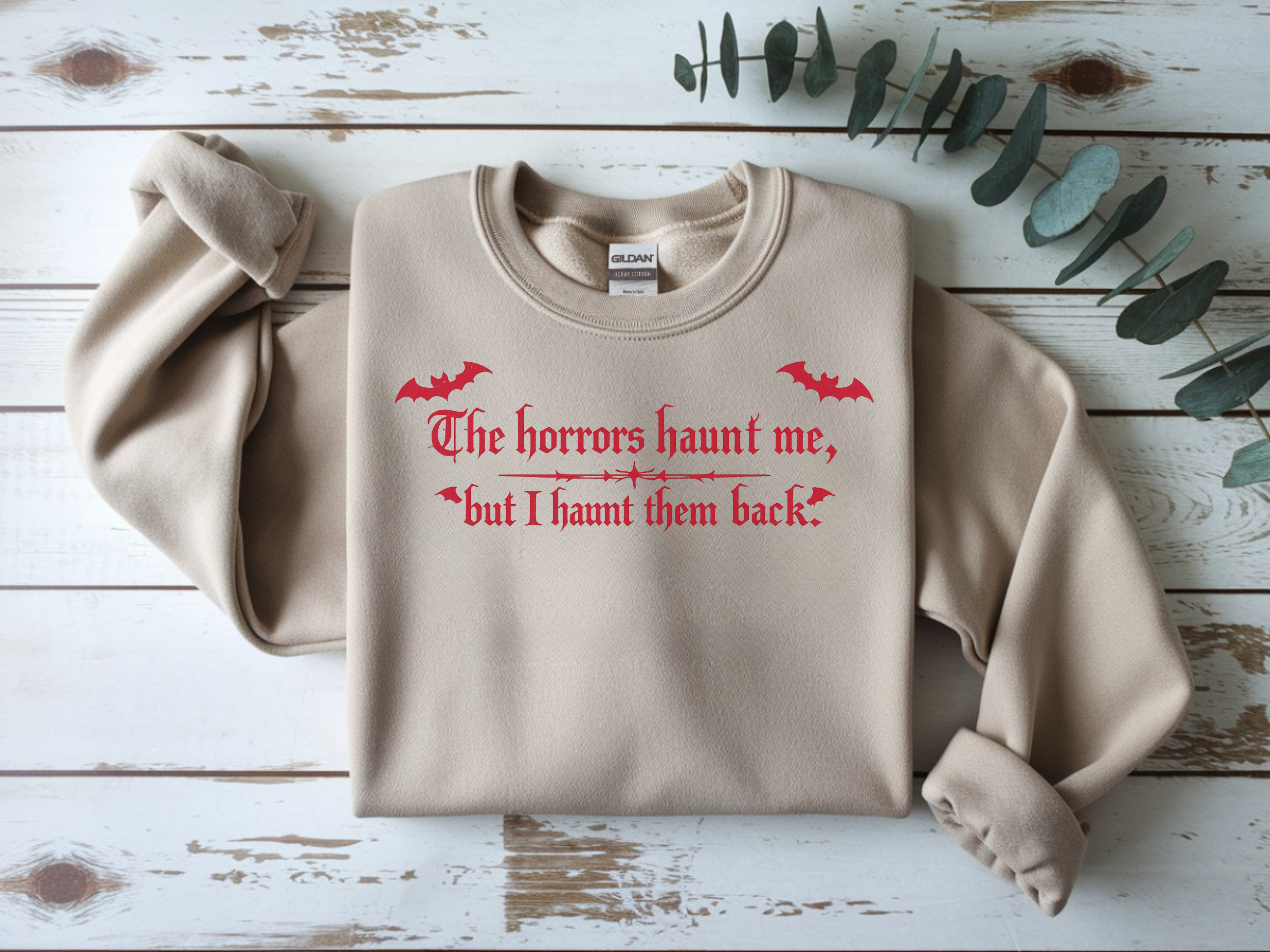 Crewneck Sweatshirt — "The horrors haunt me, but I haunt them back" Red Gothic Halloween Design