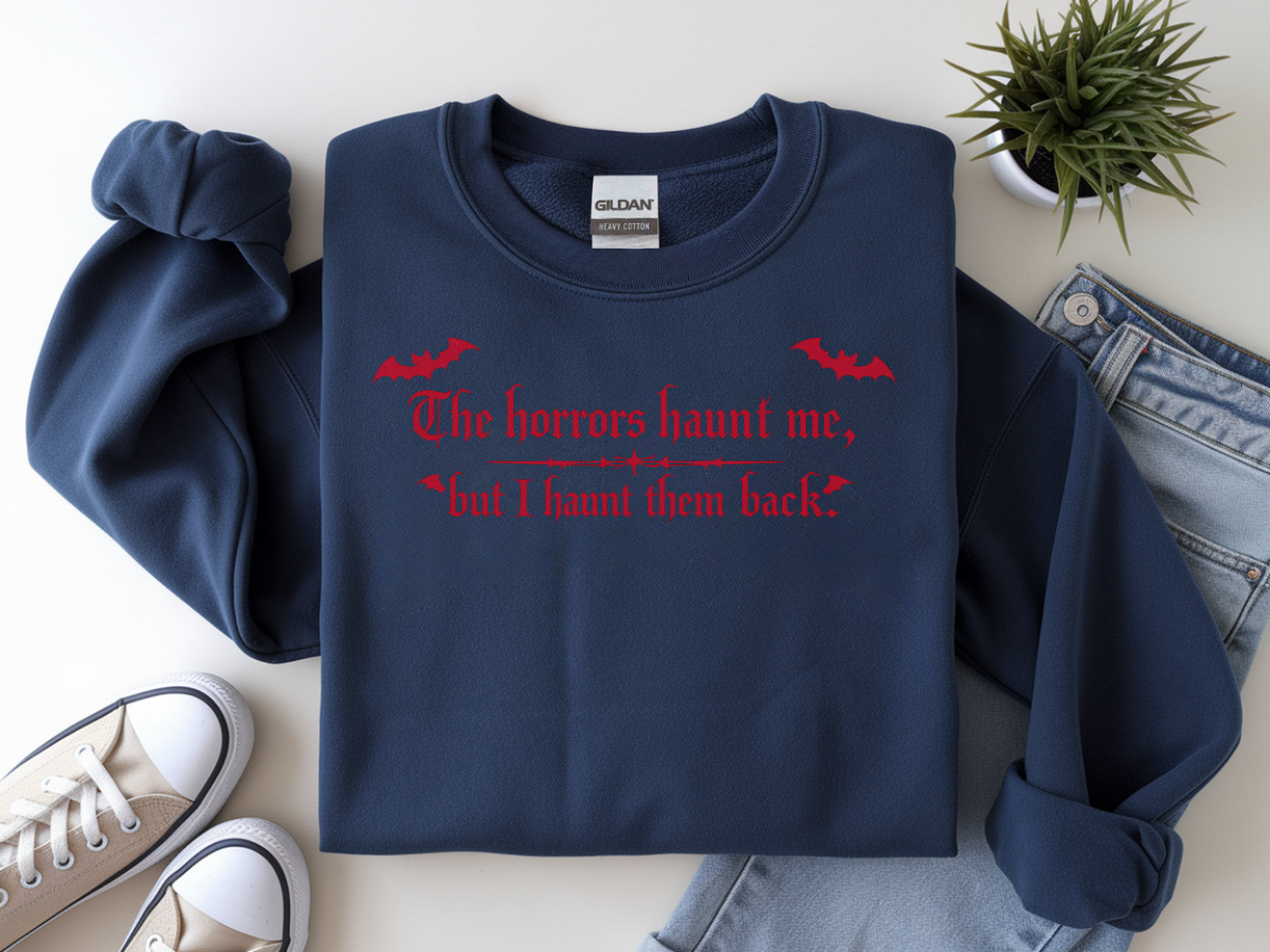 Crewneck Sweatshirt — "The horrors haunt me, but I haunt them back" Red Gothic Halloween Design