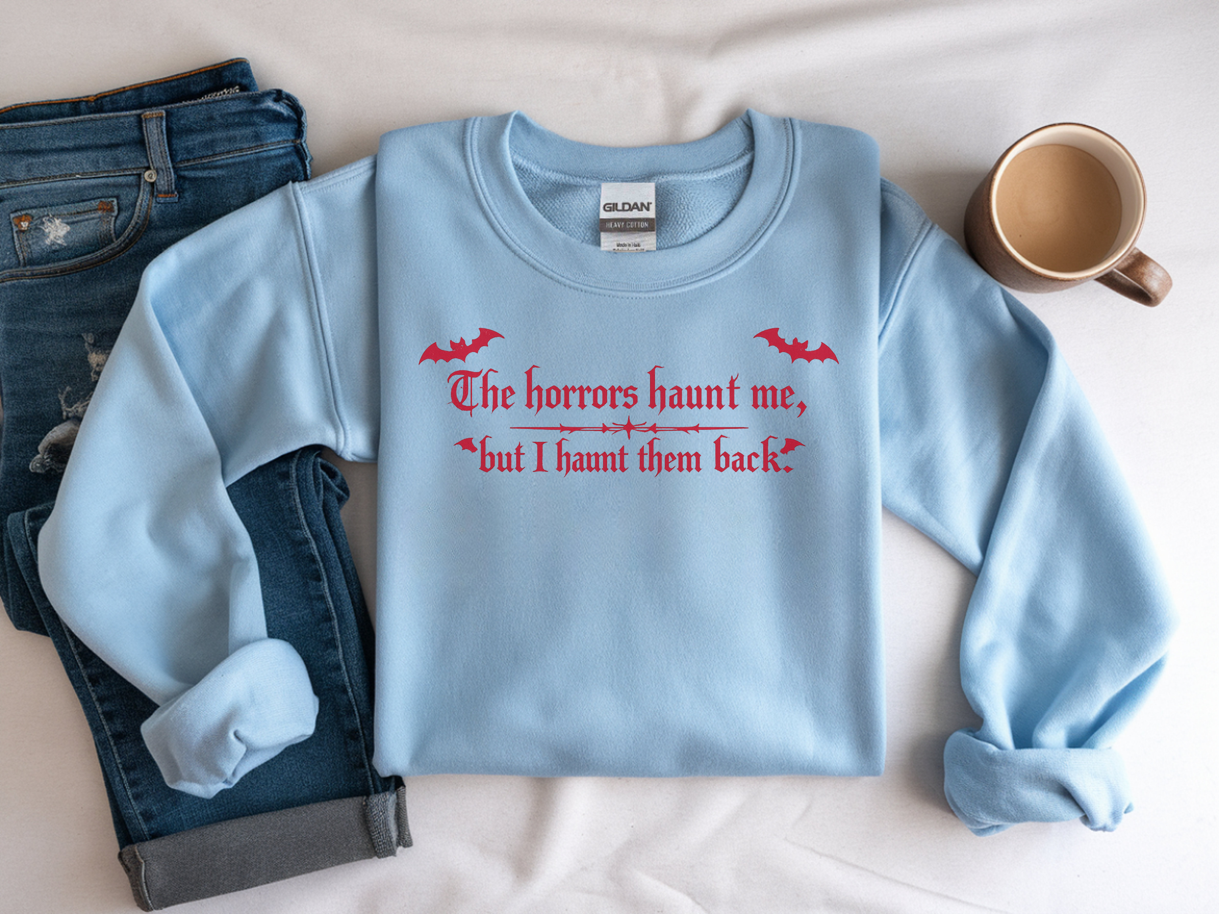 Crewneck Sweatshirt — "The horrors haunt me, but I haunt them back" Red Gothic Halloween Design