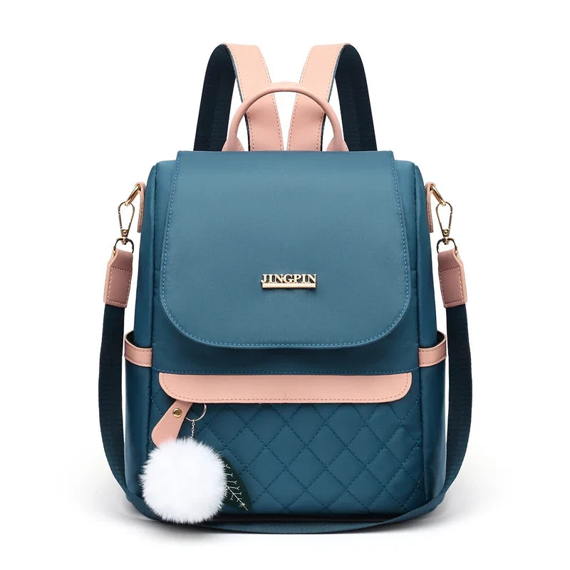 Quilted Mini Backpack Purse, Stylish Convertible Shoulder Bag with Flap Closure, Compact Daypack with Adjustable Straps & Pom Pom Charm