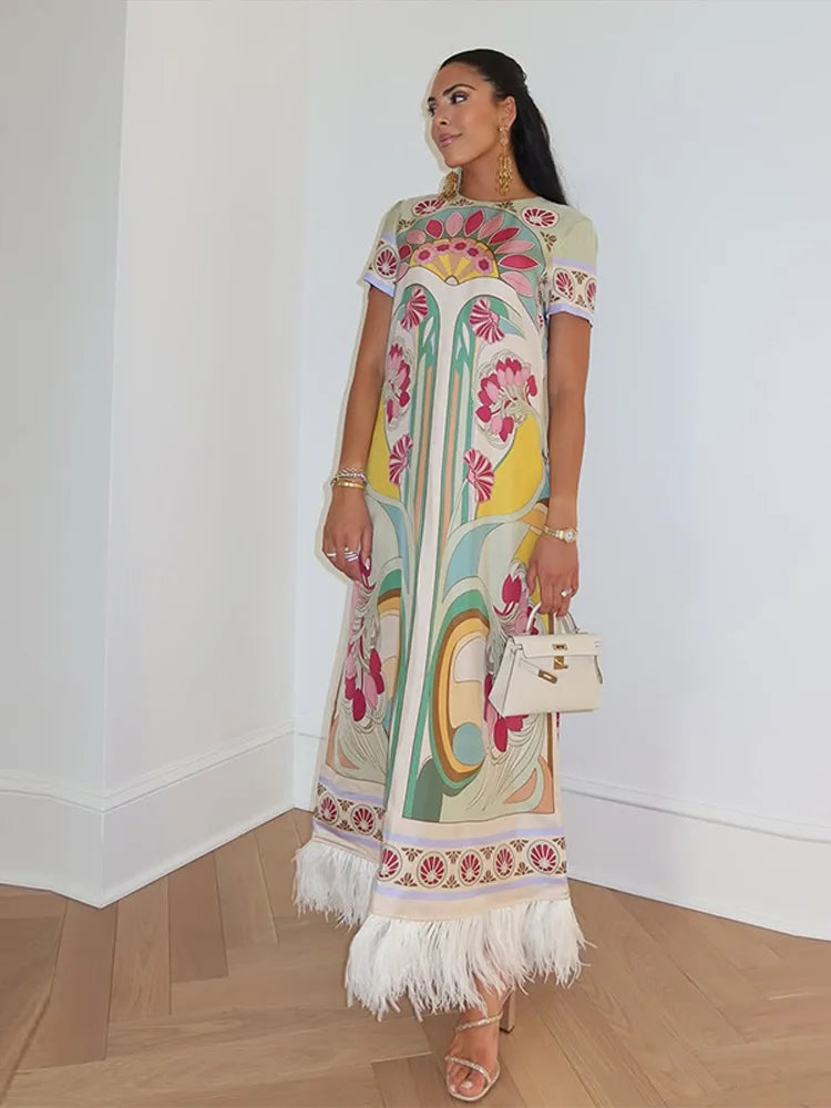 Boho Floral Maxi Dress – Short Sleeve Printed Dress with Round Neck, Fringe Hem, Flowing Silhouette and Statement Pattern