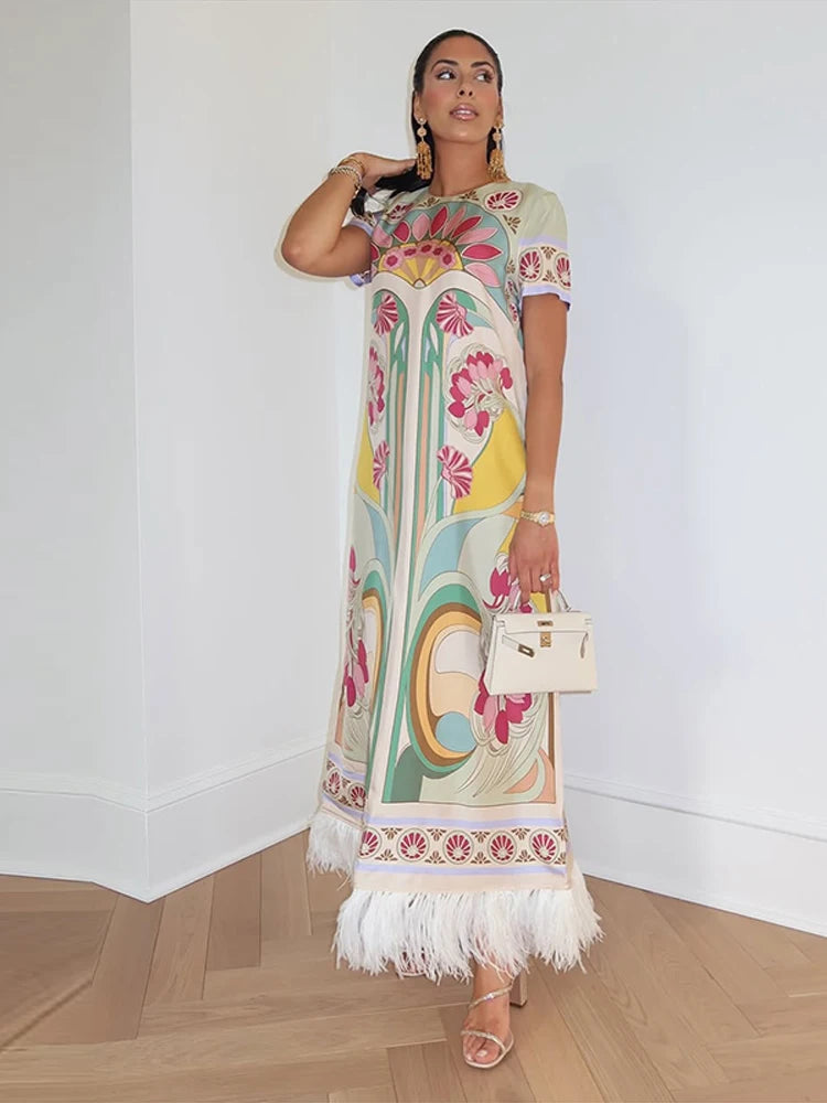 Boho Floral Maxi Dress – Short Sleeve Printed Dress with Round Neck, Fringe Hem, Flowing Silhouette and Statement Pattern