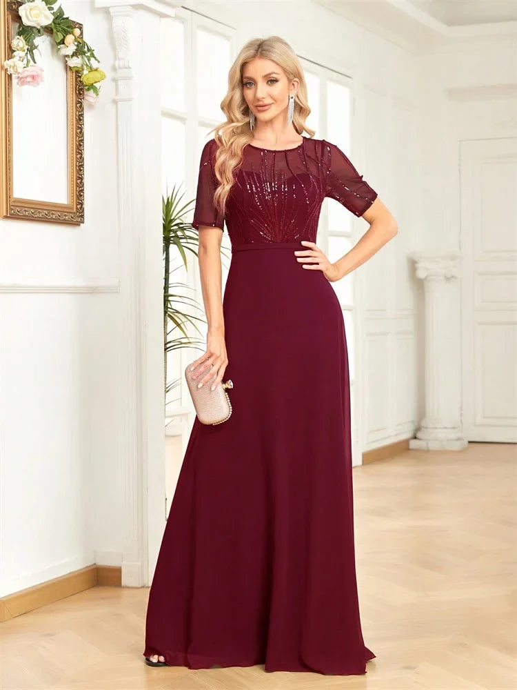 Embroidered Maxi Dress – Short Sleeve Round Neck Gown with Sheer Embellished Bodice, Defined Waist and Flowing Floor-Length Skirt