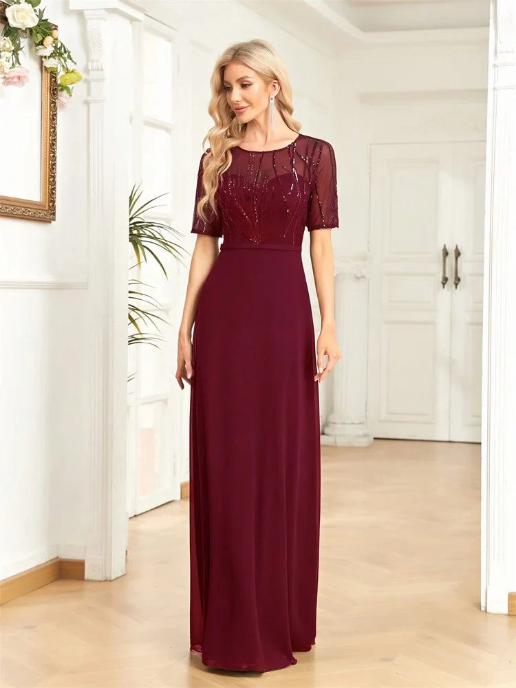 Embroidered Maxi Dress – Short Sleeve Round Neck Gown with Sheer Embellished Bodice, Defined Waist and Flowing Floor-Length Skirt