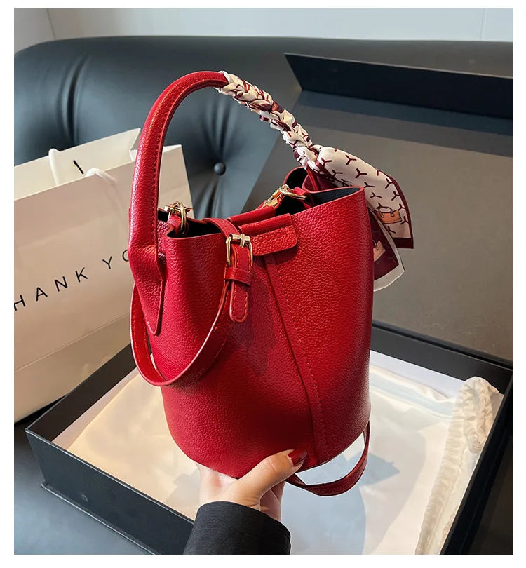 Red Bucket Shoulder Bag, Elegant PU Leather Handbag, Drawstring Tote Purse with Scarf-Wrapped Handle, Crossbody Strap & Gold Hardware