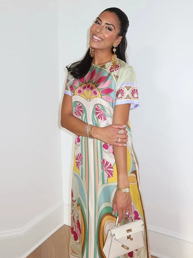 Boho Floral Maxi Dress – Short Sleeve Printed Dress with Round Neck, Fringe Hem, Flowing Silhouette and Statement Pattern