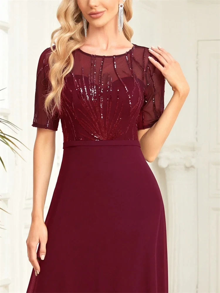 Embroidered Maxi Dress – Short Sleeve Round Neck Gown with Sheer Embellished Bodice, Defined Waist and Flowing Floor-Length Skirt