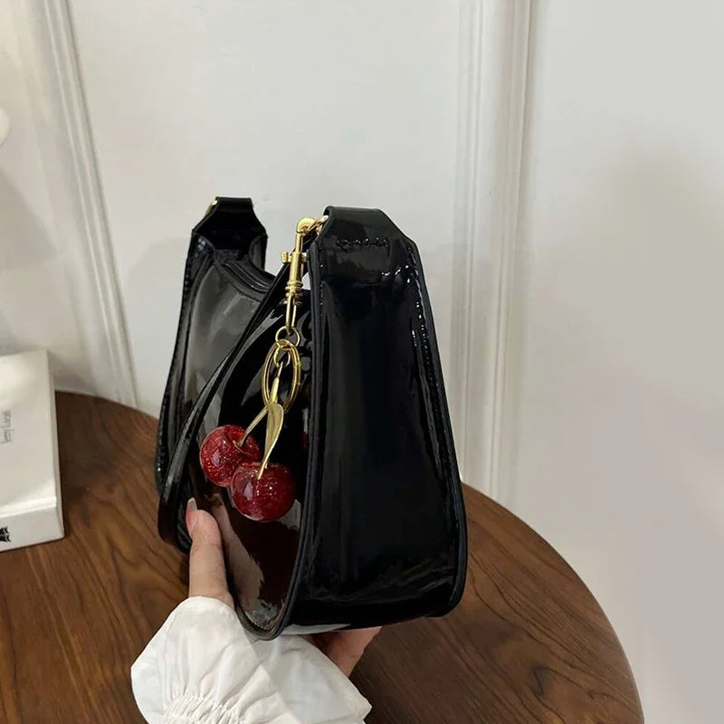 Glossy Hobo Shoulder Bag, Sleek Crescent Handbag with Adjustable Strap, Compact Crossbody Purse with Decorative Charms for Dates & Everyday Use