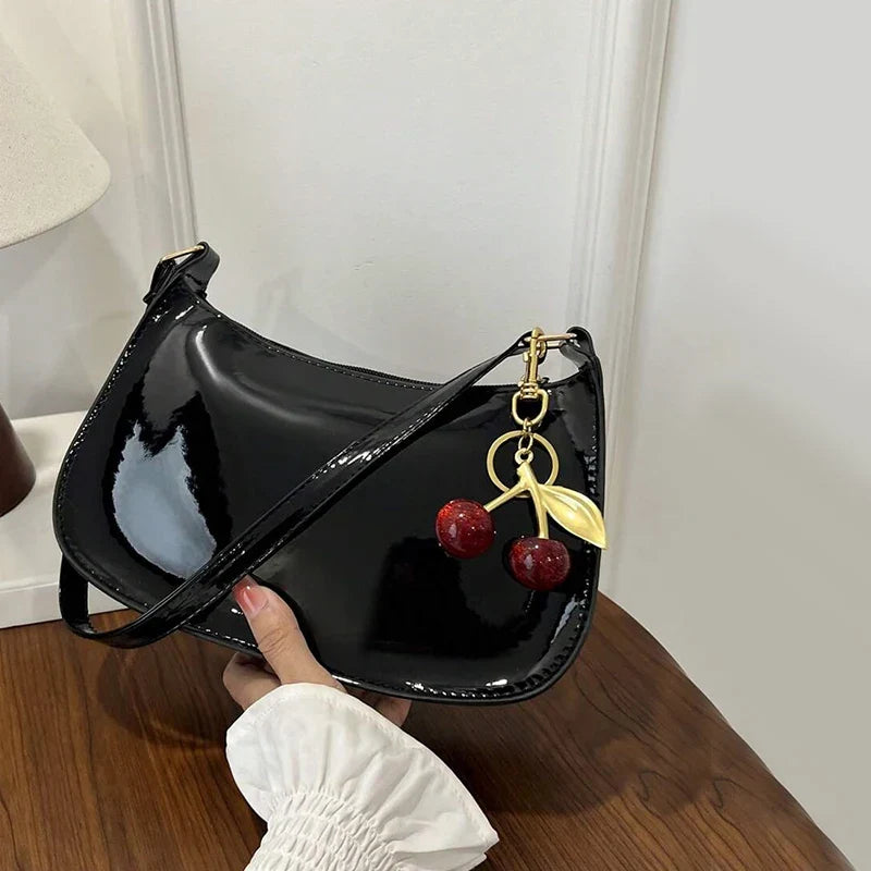 Glossy Hobo Shoulder Bag, Sleek Crescent Handbag with Adjustable Strap, Compact Crossbody Purse with Decorative Charms for Dates & Everyday Use